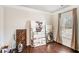 Home office with hardwood floors and large window at 6094 Whitetail Deer Run, Mableton, GA 30126