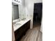 Double vanity bathroom with white countertop and view of bedroom at 5958 King Way Walk, Lithonia, GA 30058