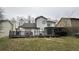 Two-story house with deck and yard at 5958 King Way Walk, Lithonia, GA 30058