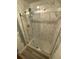 Modern shower with glass enclosure and marble tile at 5958 King Way Walk, Lithonia, GA 30058