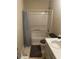 Bathroom features a shower-tub combo, a toilet, a sink, and ceramic tile flooring at 6603 Biscayne Blvd, Rex, GA 30273