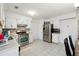 Bright kitchen with stainless steel appliances and white cabinets at 10342 Beta Ct, Jonesboro, GA 30238