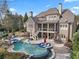 Luxury backyard oasis with a large pool and spa at 2330 Tayside Nw Xing, Kennesaw, GA 30152