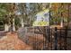 Entrance to park with a sign and black fence at 2367 Millhaven Se St # 15, Smyrna, GA 30080