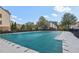 Community pool with a green cover at 2367 Millhaven Se St # 15, Smyrna, GA 30080