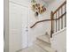Staircase with decorative railing and wall shelving at 2367 Millhaven Se St # 15, Smyrna, GA 30080