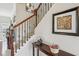 Elegant staircase with wrought iron spindles and wood handrail at 2367 Millhaven Se St # 15, Smyrna, GA 30080