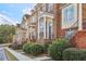 Brick townhomes with front porches and landscaping at 2367 Millhaven Se St # 15, Smyrna, GA 30080