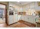 Functional kitchen with white appliances, ample counter space, and an adjacent breakfast area at 3472 Honeycomb Se Dr, Conyers, GA 30094