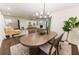 Elegant dining area features modern chandelier, hardwood floors, and stylish furnishings at 3800 William Paul Dr, Austell, GA 30106