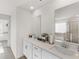 Elegant bathroom with double vanity and soaking tub at 7767 Richmond Trl, Fairburn, GA 30213