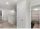 Upstairs bathroom with shower/tub combo and neutral color palette at 7767 Richmond Trl, Fairburn, GA 30213
