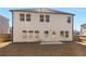 Two-story house with backyard and patio at 7767 Richmond Trl, Fairburn, GA 30213