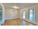Dining room featuring hardwood floors and built-in shelving at 4129 Shorter Way, Decatur, GA 30034