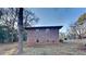 Brick house exterior showcasing a side view and landscaping at 4129 Shorter Way, Decatur, GA 30034
