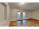Bright living room with hardwood floors and large windows at 4129 Shorter Way, Decatur, GA 30034