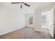 Well-lit bedroom with a window and access to a small, adjacent room at 3055 Momerath Ct, Decatur, GA 30032