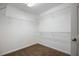 Large walk-in closet with wire shelving and carpet flooring at 3055 Momerath Ct, Decatur, GA 30032