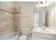 Well-lit bathroom, featuring a shower/tub combo at 4938 Kanawha Blf, Stone Mountain, GA 30087