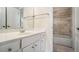 Bathroom boasts a vanity, shower, and tiled floors at 4938 Kanawha Blf, Stone Mountain, GA 30087