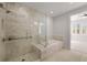 Elegant bathroom featuring a soaking tub and a walk-in shower at 58 Canton St # 303, Alpharetta, GA 30009