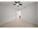 Bright bedroom with ceiling fan and access to another room at 58 Canton St # 303, Alpharetta, GA 30009