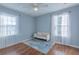 Cozy bedroom featuring hardwood floors and natural light at 1110 1St Nw St, Atlanta, GA 30318