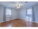 Bedroom with hardwood floors, light blue walls and ceiling fan at 1110 1St Nw St, Atlanta, GA 30318