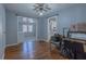 Dining area with hardwood floors and an open concept to kitchen at 1110 1St Nw St, Atlanta, GA 30318