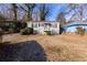 Tan house with white steps and porch, situated on a grassy lot at 1110 1St Nw St, Atlanta, GA 30318