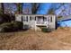 Charming house with front porch and well-maintained lawn at 1110 1St Nw St, Atlanta, GA 30318