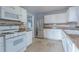 Kitchen with white cabinets, stainless steel appliances, and tile floor at 1110 1St Nw St, Atlanta, GA 30318