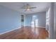 Living room features hardwood floors and light blue walls at 1110 1St Nw St, Atlanta, GA 30318