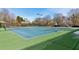 Two well-maintained tennis courts, perfect for recreation at 1302 Calderwood Se Ct, Smyrna, GA 30080