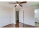 Bedroom with double door closet and ceiling fan at 2103 Columbia Dr, Decatur, GA 30032