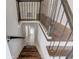 Elegant staircase with dark wood and metal railings at 2103 Columbia Dr, Decatur, GA 30032