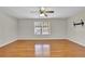 Bedroom with hardwood floors and large window at 3018 Crest Ridge Sw Cir, Marietta, GA 30060