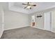 Spacious bedroom with carpet flooring and ceiling fan at 3018 Crest Ridge Sw Cir, Marietta, GA 30060