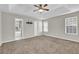 Spacious main bedroom with ceiling fan and en-suite bathroom access at 3018 Crest Ridge Sw Cir, Marietta, GA 30060