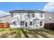 House exterior showcasing a spacious backyard at 3055 Cooper Woods Ln, Loganville, GA 30052