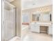 Spacious bathroom with double vanity, soaking tub, and walk-in shower at 3055 Cooper Woods Ln, Loganville, GA 30052