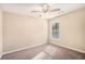 Charming bedroom with ceiling fan and window with blinds at 3055 Cooper Woods Ln, Loganville, GA 30052