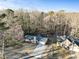 House nestled in wooded area with driveway at 4522 Karron Ln, Powder Springs, GA 30127