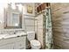 Bathroom boasts granite countertop, walk-in shower, and updated fixtures at 4522 Karron Ln, Powder Springs, GA 30127