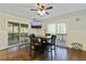 Dining area with dark wood table and chairs, access to a deck at 4522 Karron Ln, Powder Springs, GA 30127