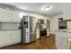 Kitchen features stainless steel appliances and granite countertops at 4522 Karron Ln, Powder Springs, GA 30127