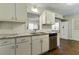 Kitchen boasts granite countertops and stainless steel appliances at 4522 Karron Ln, Powder Springs, GA 30127