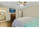 Main bedroom with king bed, dresser, and en-suite bathroom access at 4522 Karron Ln, Powder Springs, GA 30127