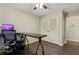 Home office features a desk, chair, and built-in closet at 4522 Karron Ln, Powder Springs, GA 30127