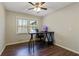 Home office with desk, chair, and large window providing natural light at 4522 Karron Ln, Powder Springs, GA 30127